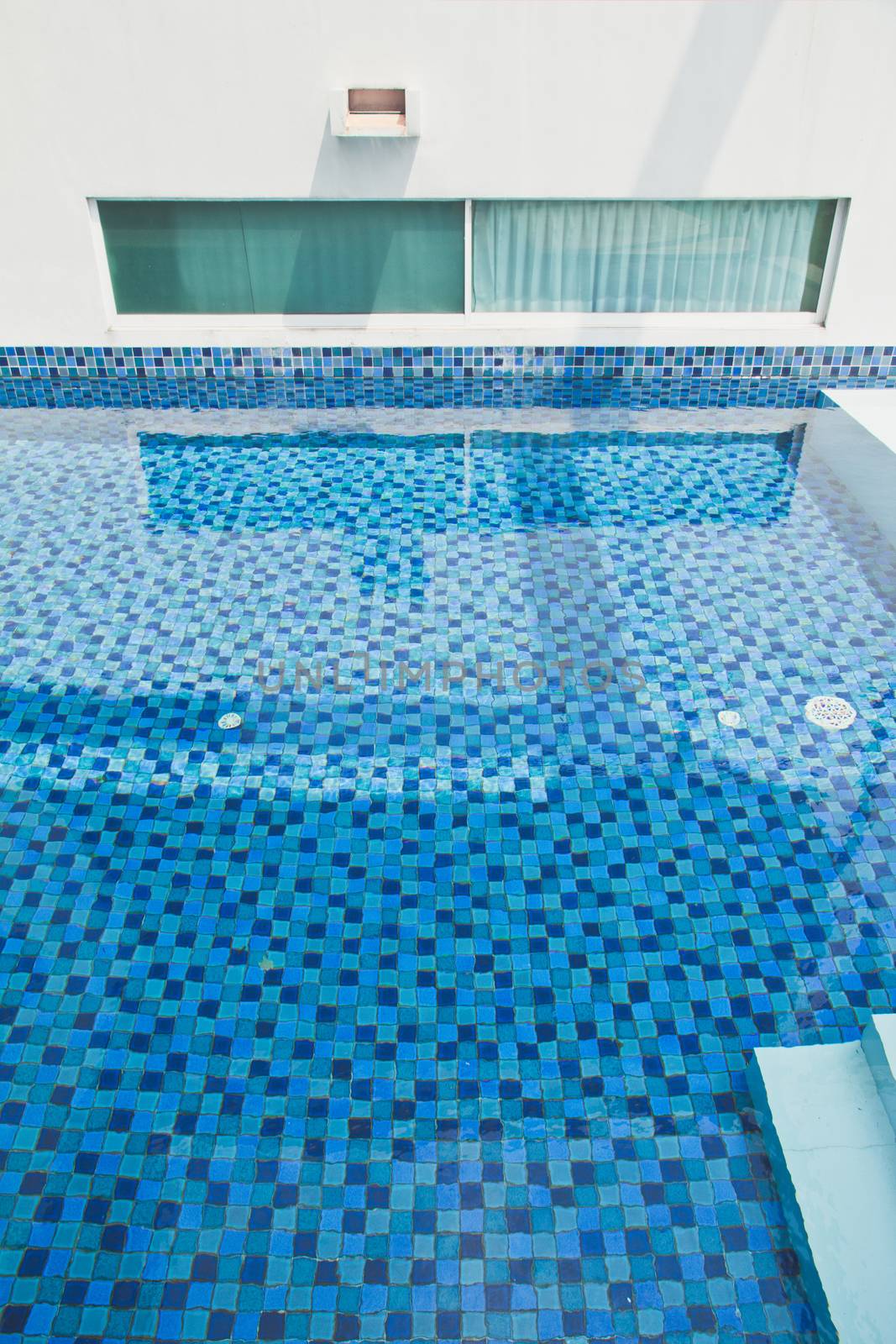 detail image of swimming pool in modern house outdoor.