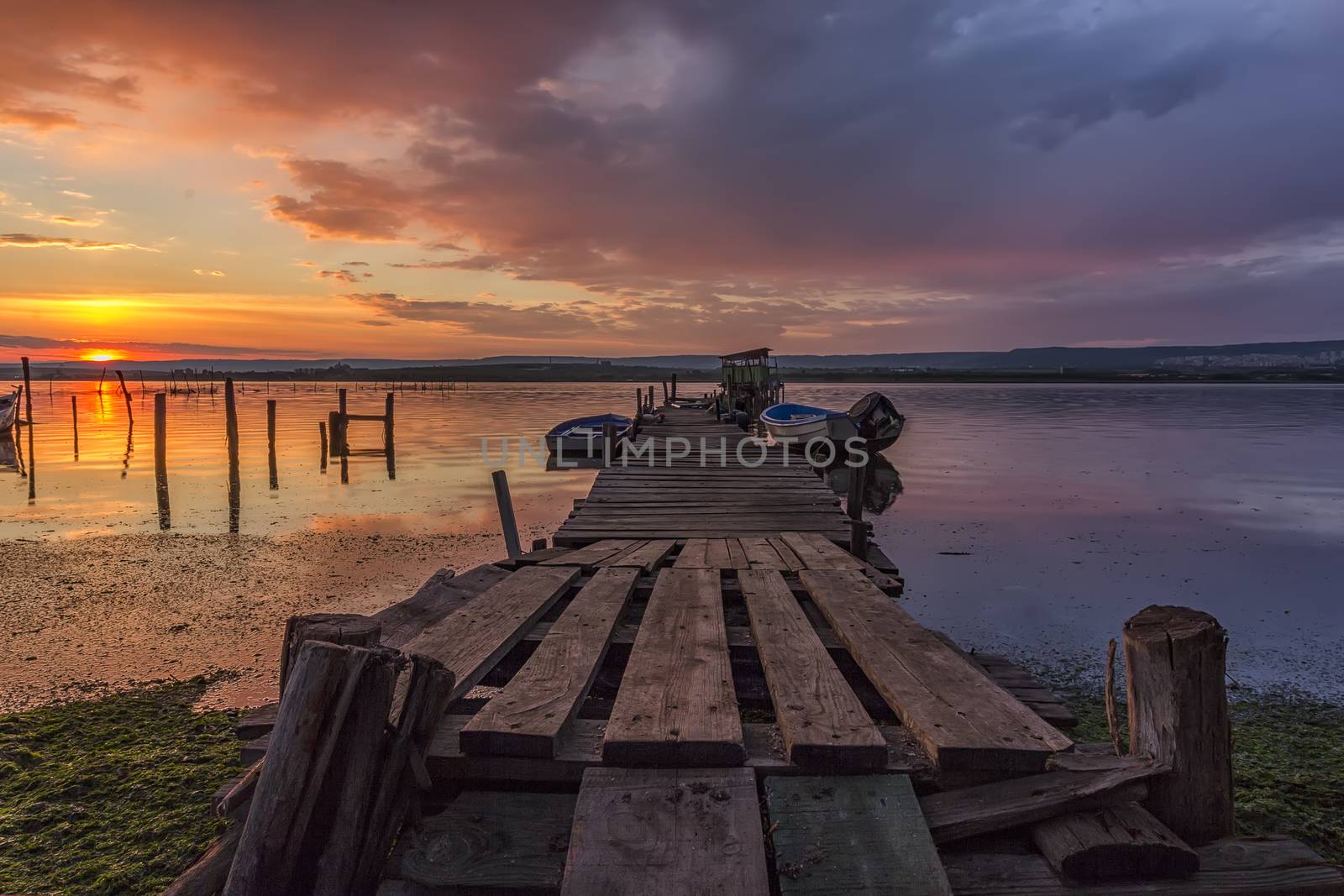 wooden pier and boats by EdVal