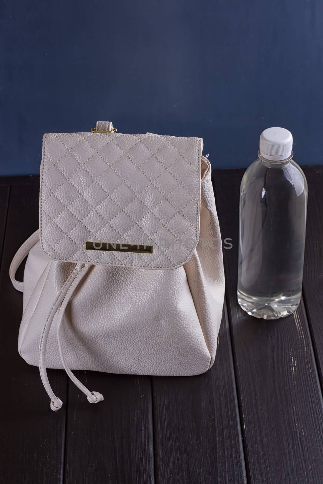 White leather backpack and water bottle by victosha