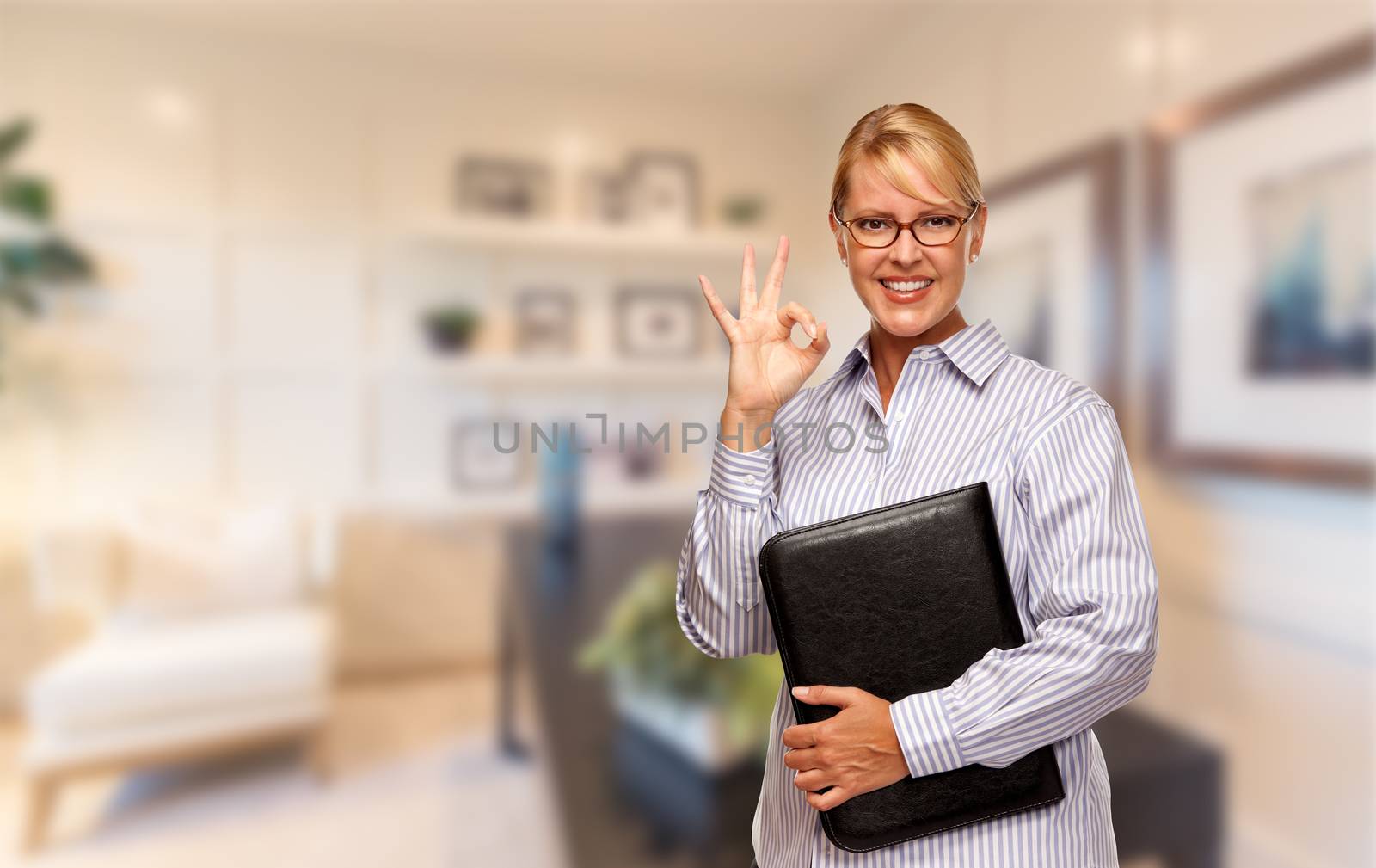 Beautiful Businesswoman In Suit and Tie Standing in His Office.