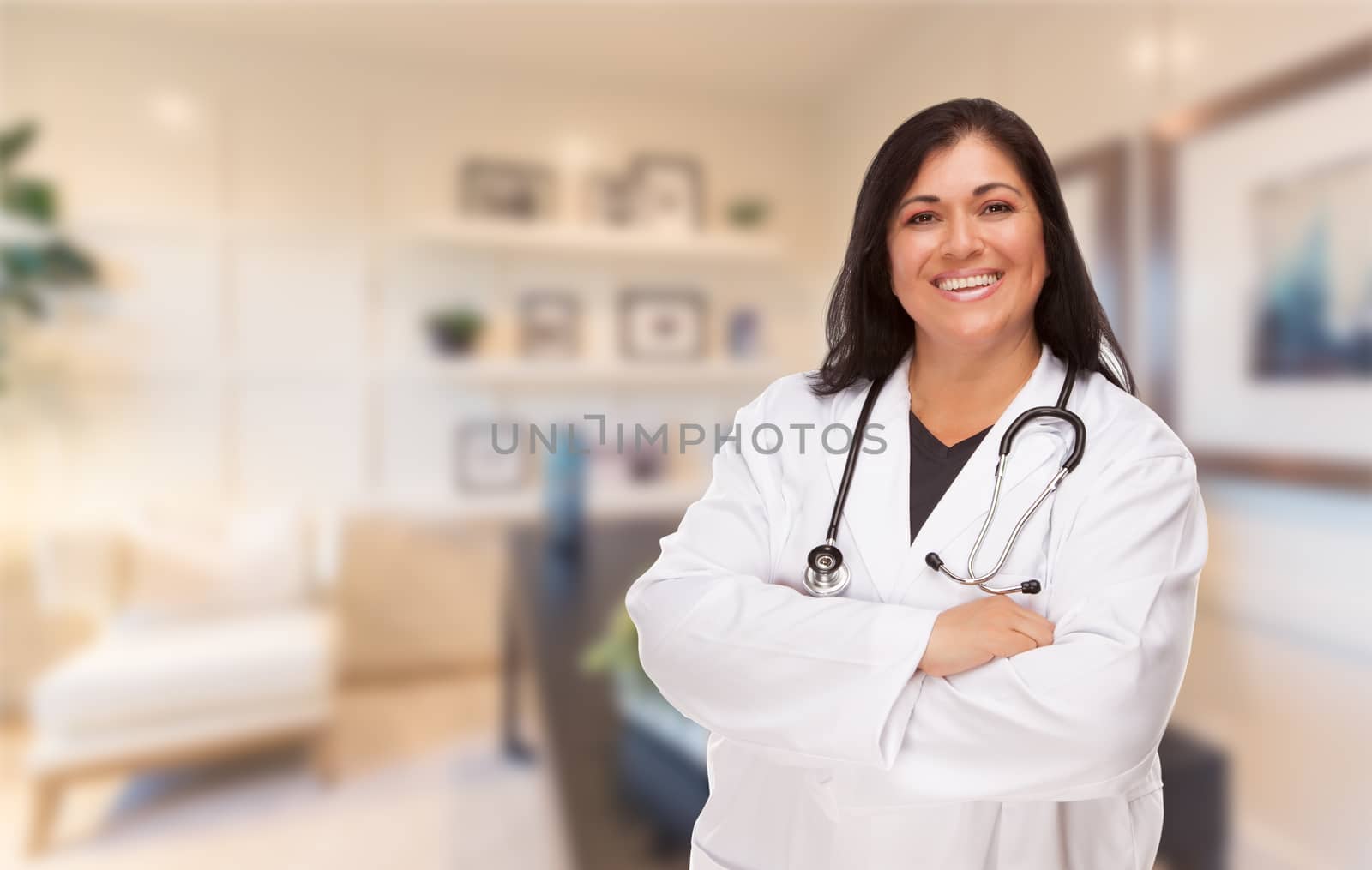 Female Hispanic Doctor or Nurse Standing in Her Office.