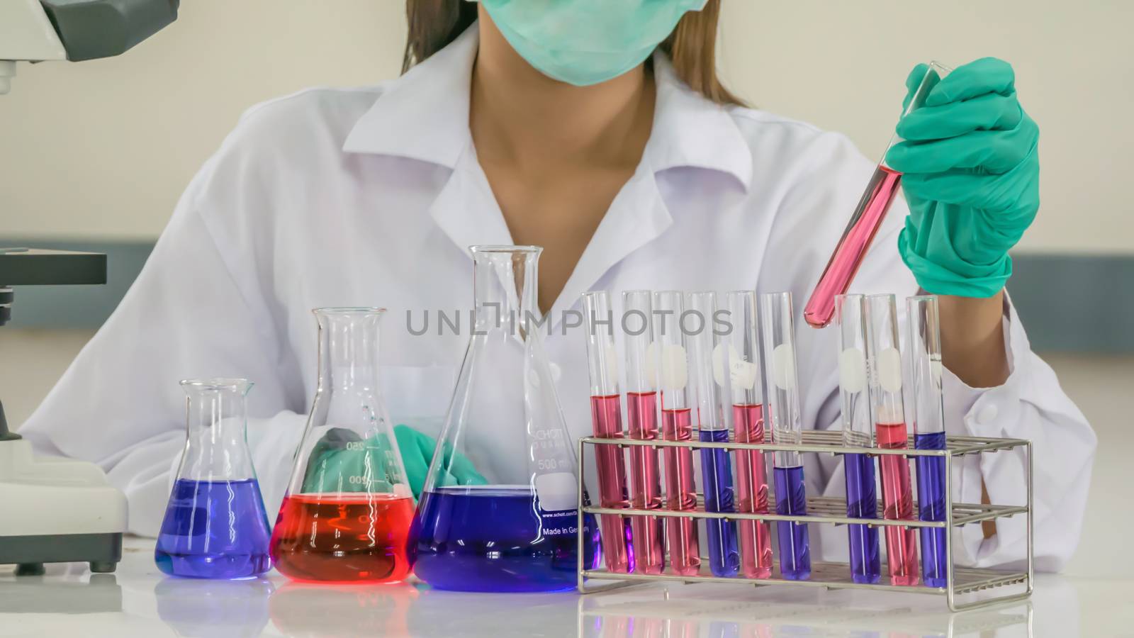 scientist with equipment and science experiments in laboratory