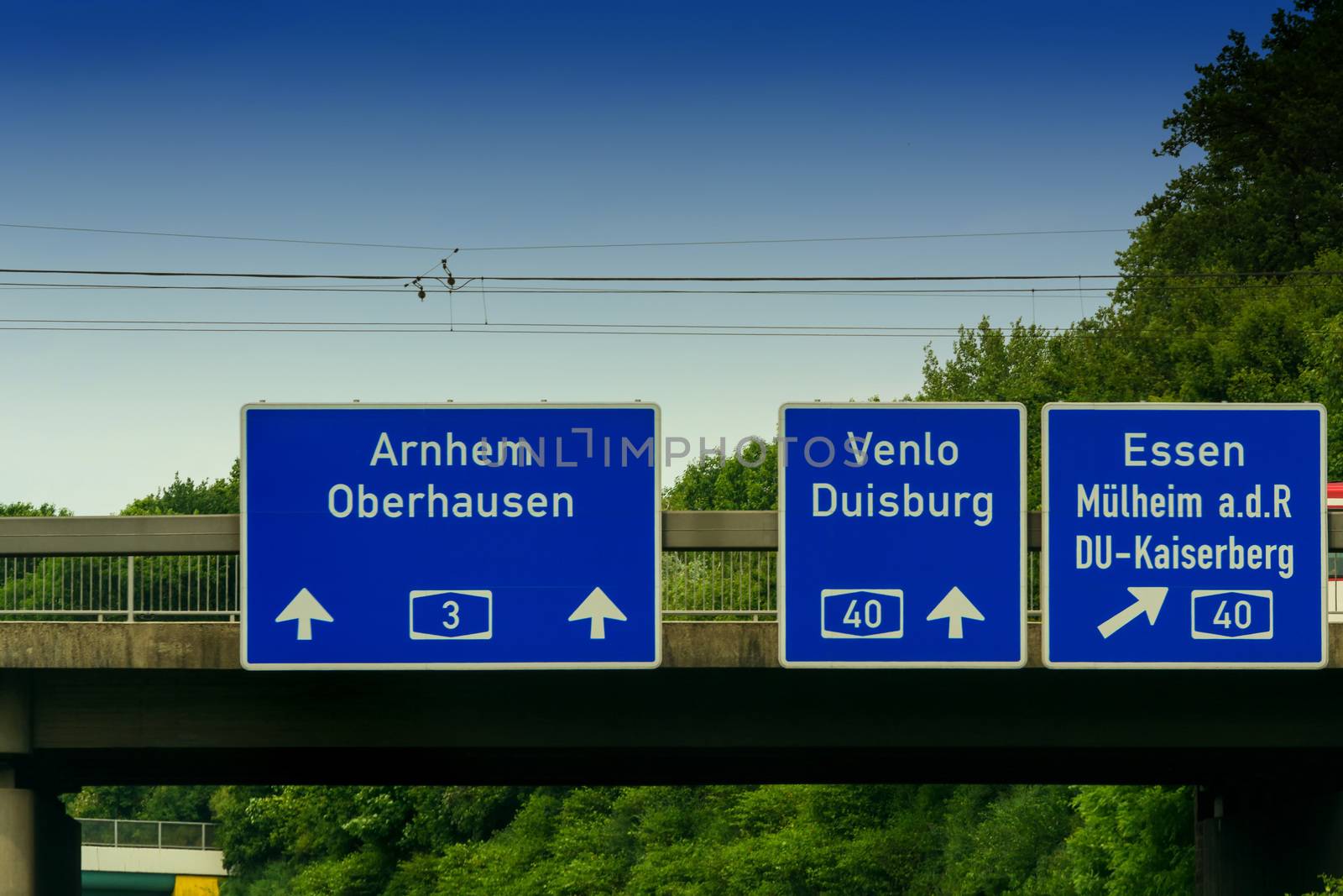 Highway sign, directional sign on the motorway A 3, direction Venlo, Duisburg, Essen, Muelheim an der Ruhr, Oberhausen, Arnhem and Highway crossing Kaiserberg.