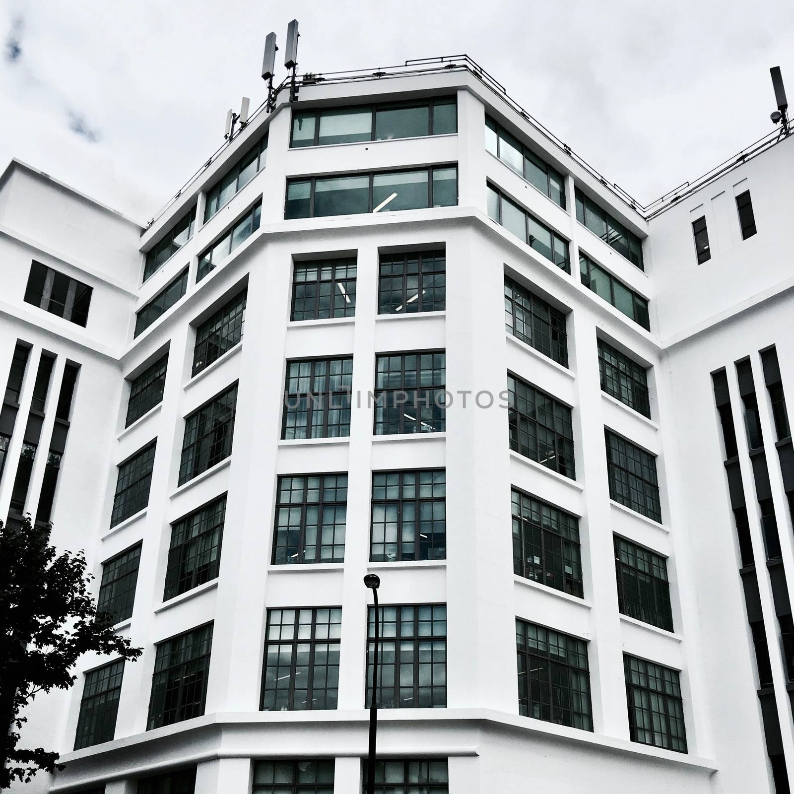 White big office building by adriantoday