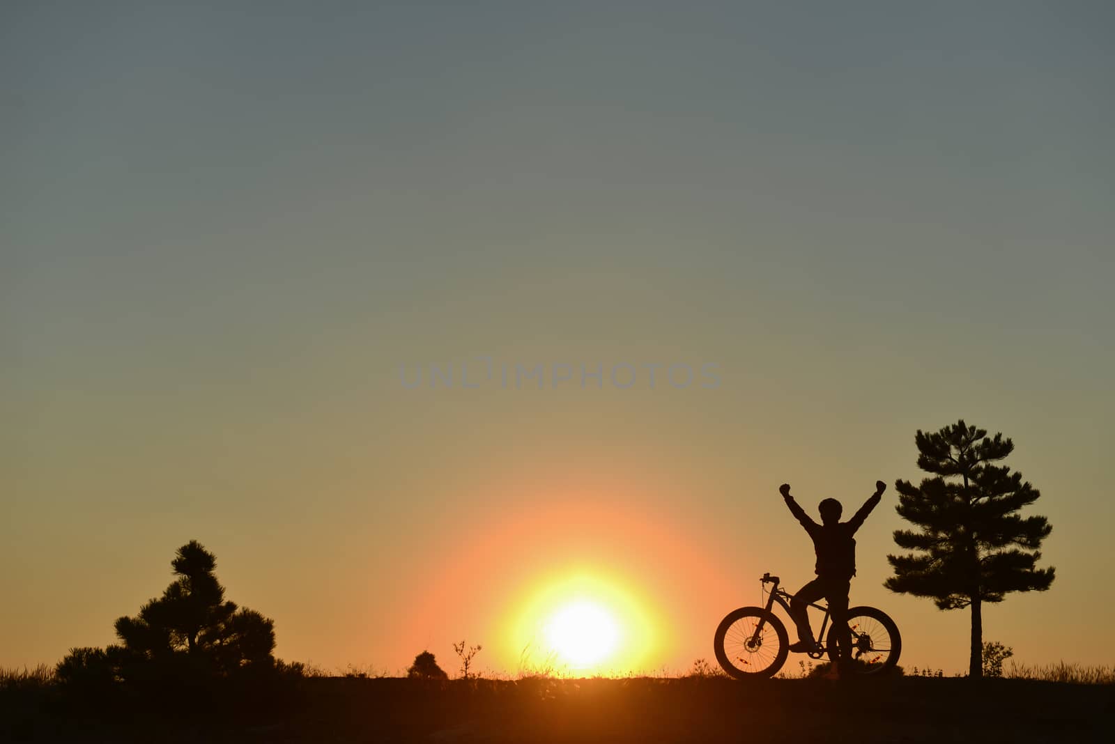 Sunrise and new excitement for cyclist by crazymedia007