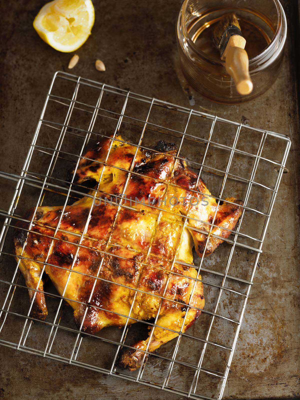 close up of rustic barbecued whole chicken