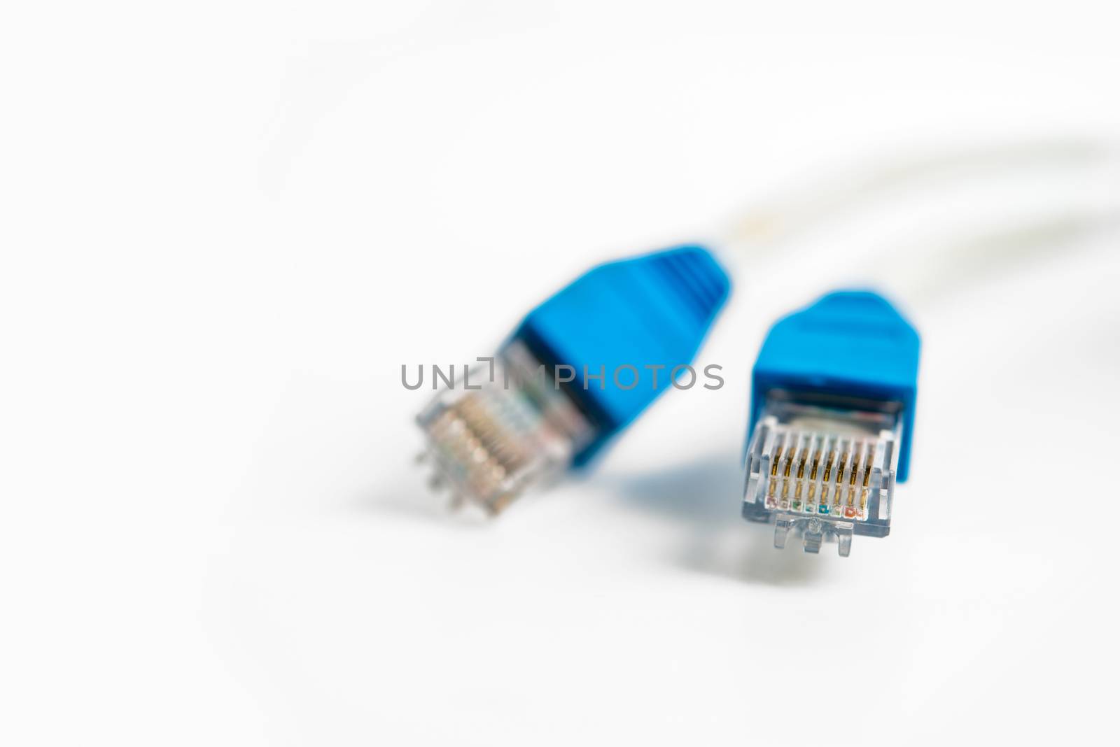 Network cable with RJ 45 connector on white background