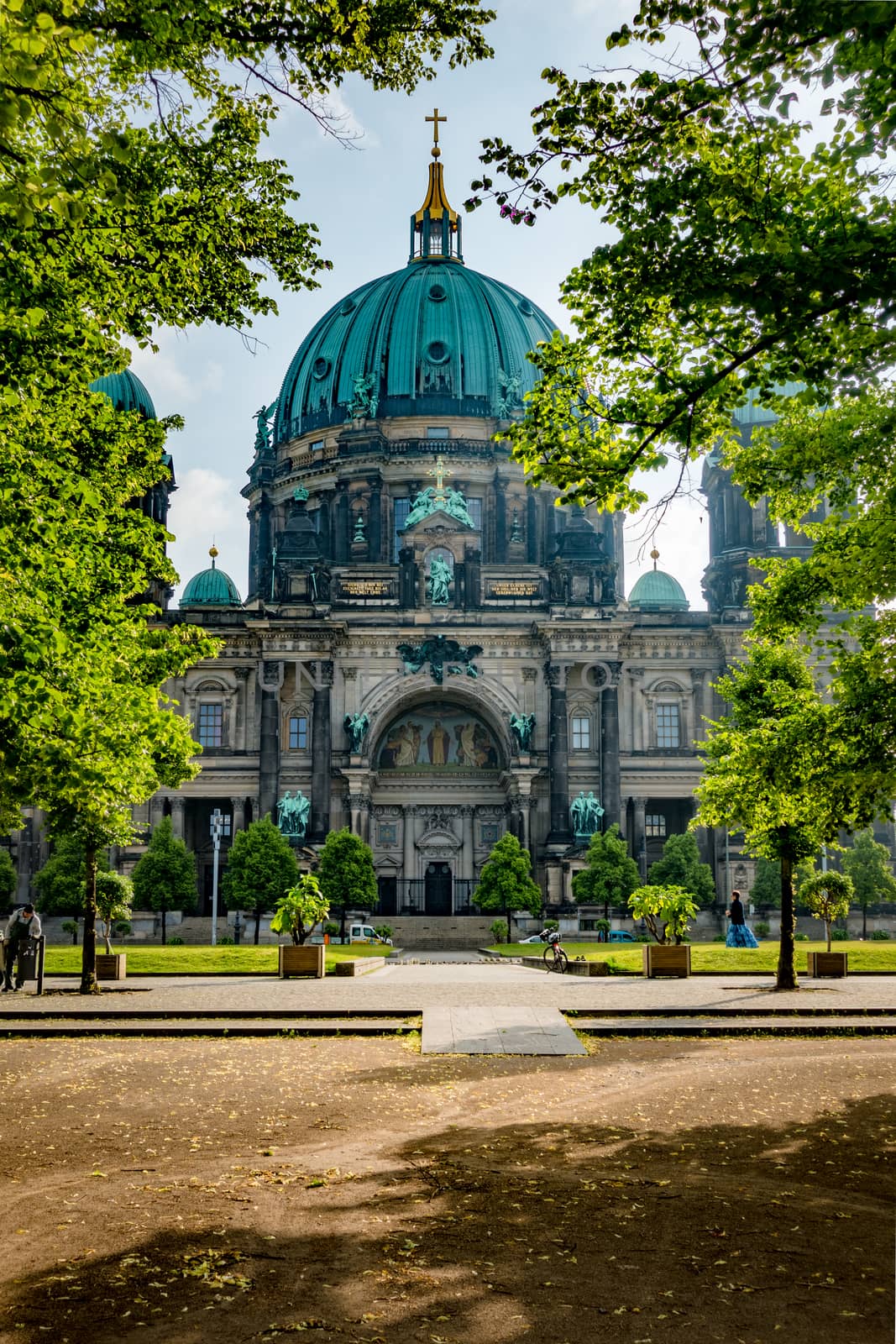 Berlin Cathedral Berliner Dom, Germany through the trees of Lustgarten park