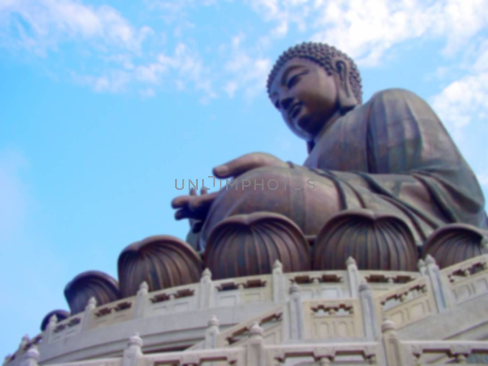 Blurred Tian Tan Buddha statue background, Po Lin Monastery, Lantau Island, Hong Kong, China