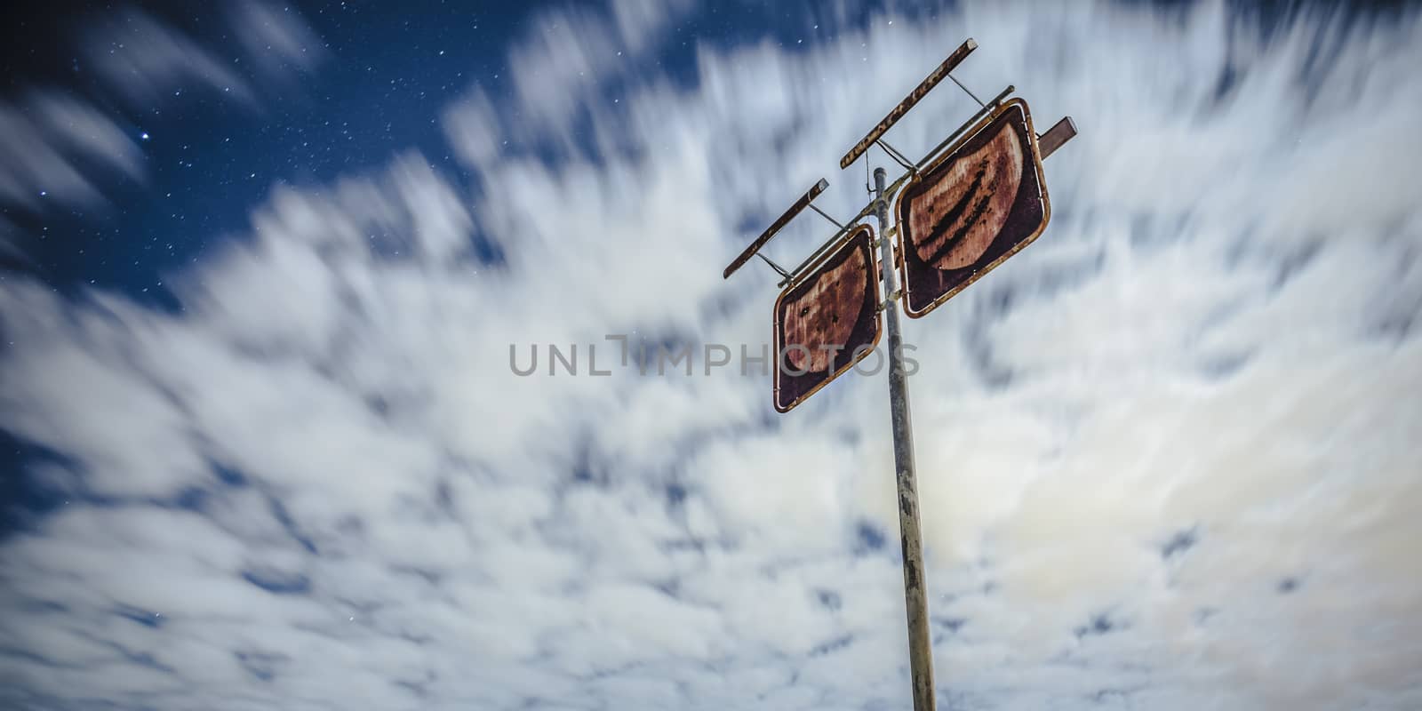 Old rustic fuel station sign in the countryside by artistrobd