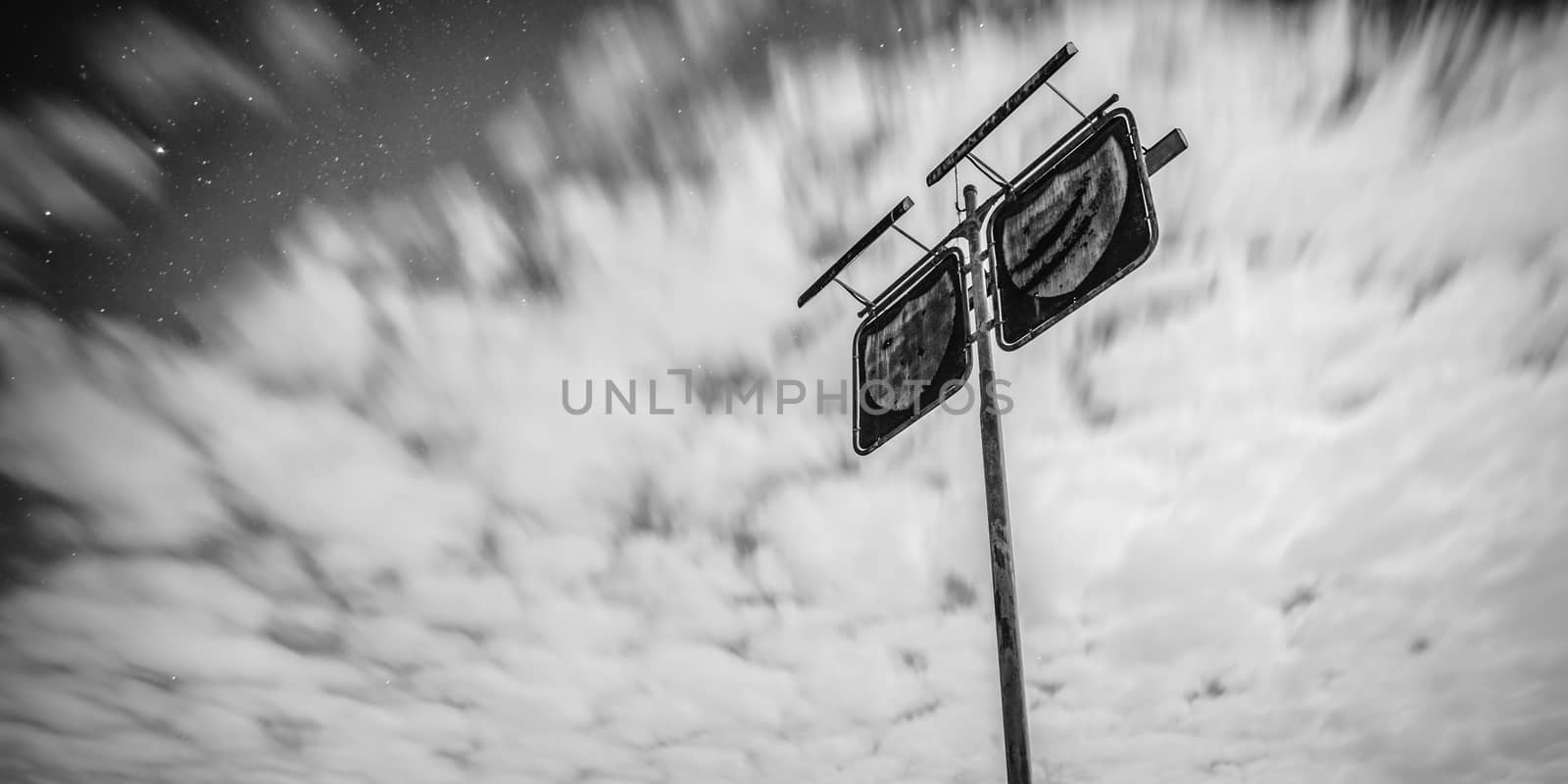 Old rustic fuel station sign in the countryside by artistrobd