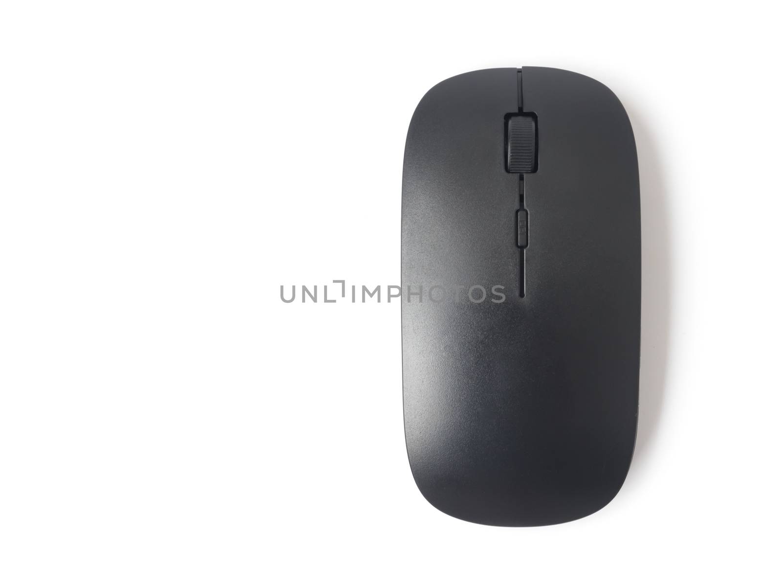 Black wireless computer mouse on white background, technology concept