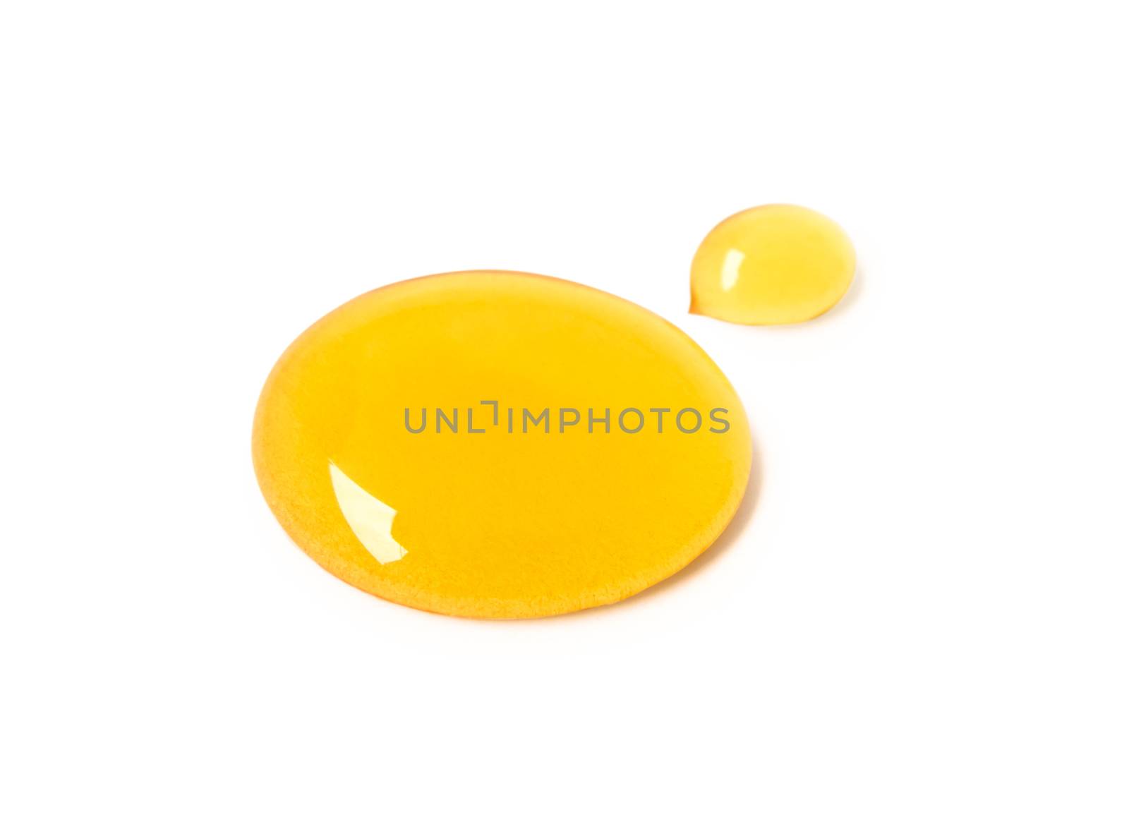 Sweet honey drop isolated on white background with clipping path by pt.pongsak@gmail.com