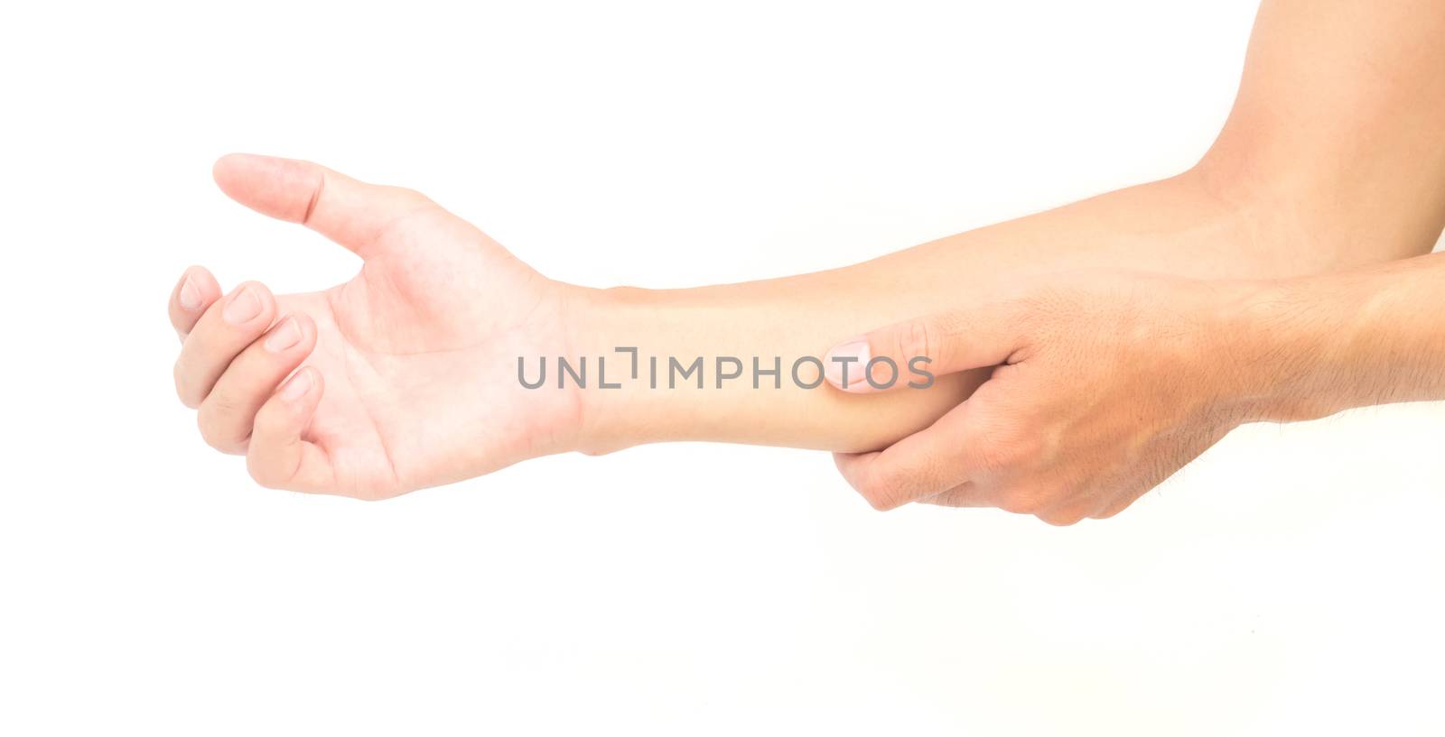 Man hand holding his arm with pain on white background, health c by pt.pongsak@gmail.com