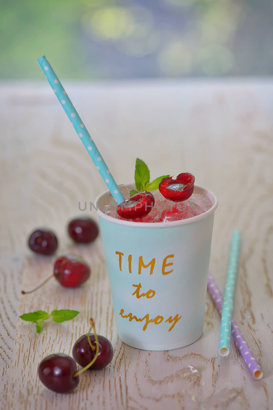 cherry syrup with ice in summer time