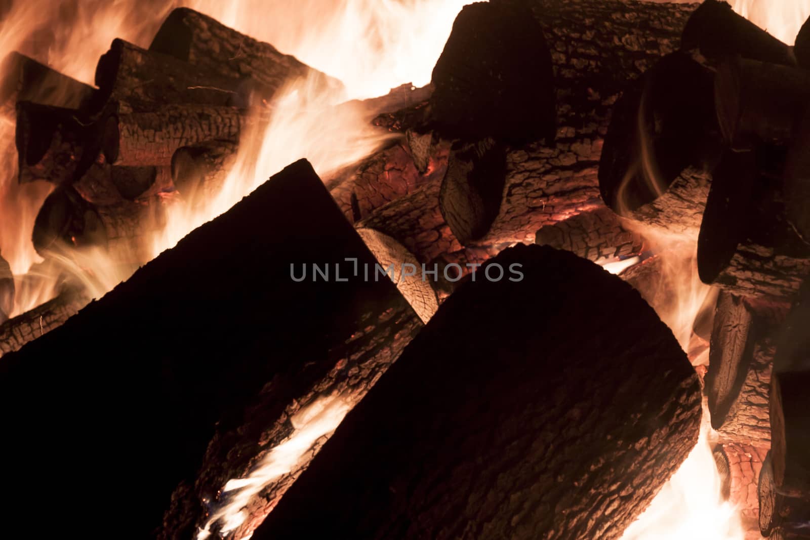 Fire from wood in industrial stove by parys