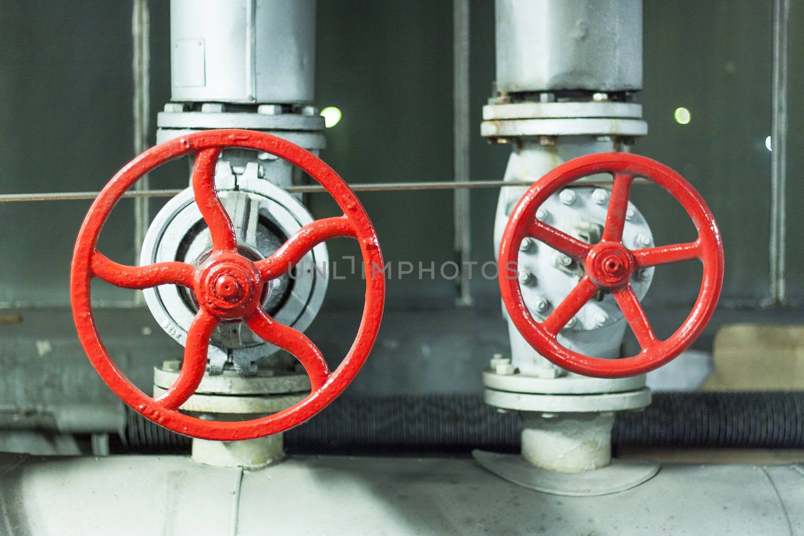 Red safety valves. by parys