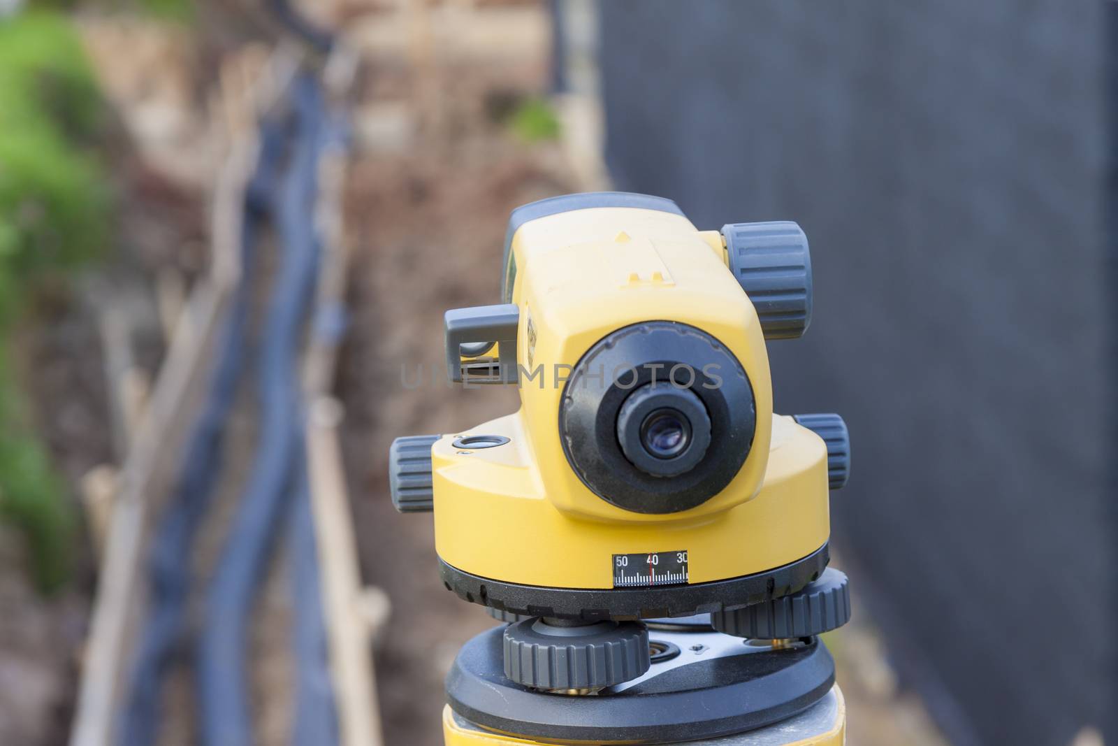 Surveyor equipment optical level at construction site