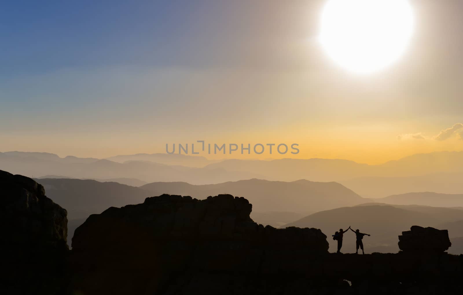 climbers reaching the goal together by crazymedia007