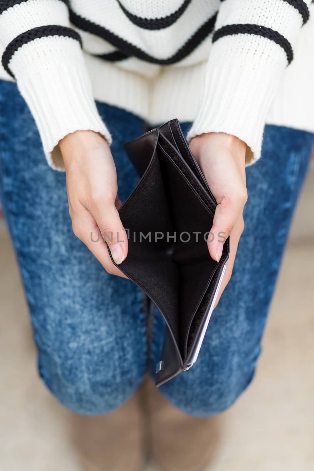 Woman with an empty wallet
