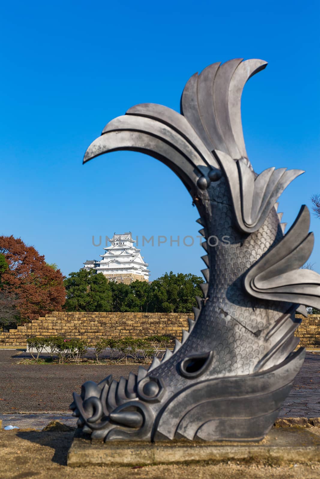 Himeji castle and shachihoko statue by leungchopan