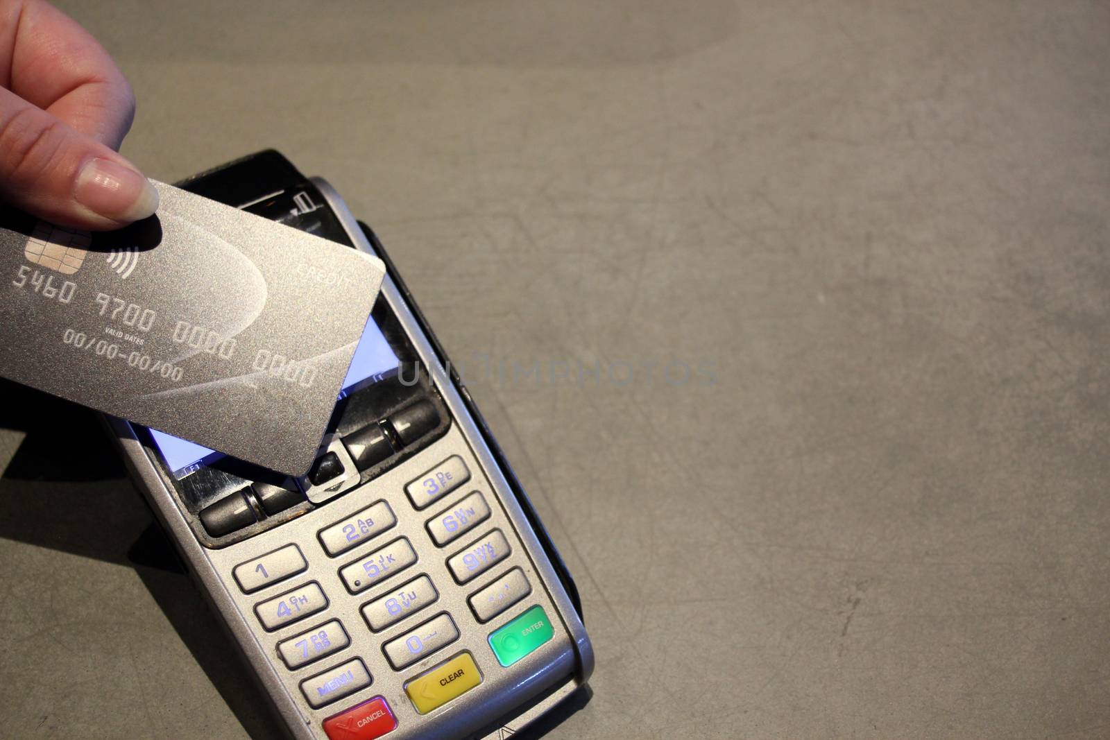 contactless payment card pdq background copy space with hand holding credit card ready to pay