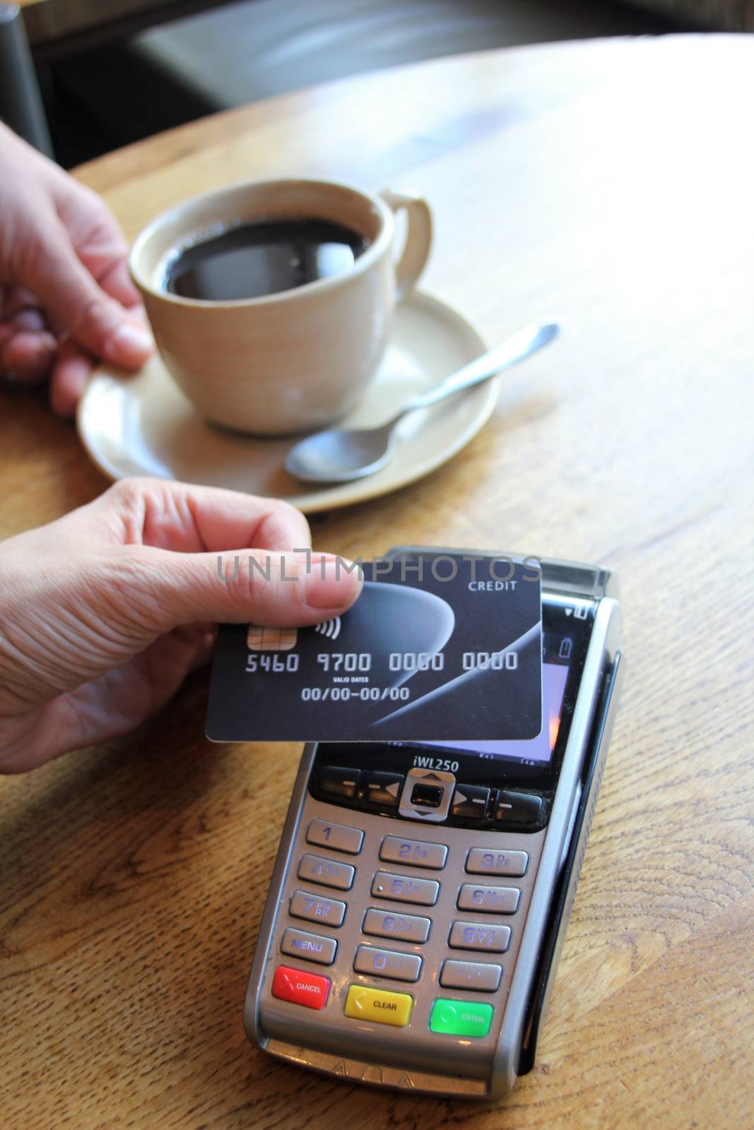 contactless payment card pdq background copy space with hand holding credit card ready to pay