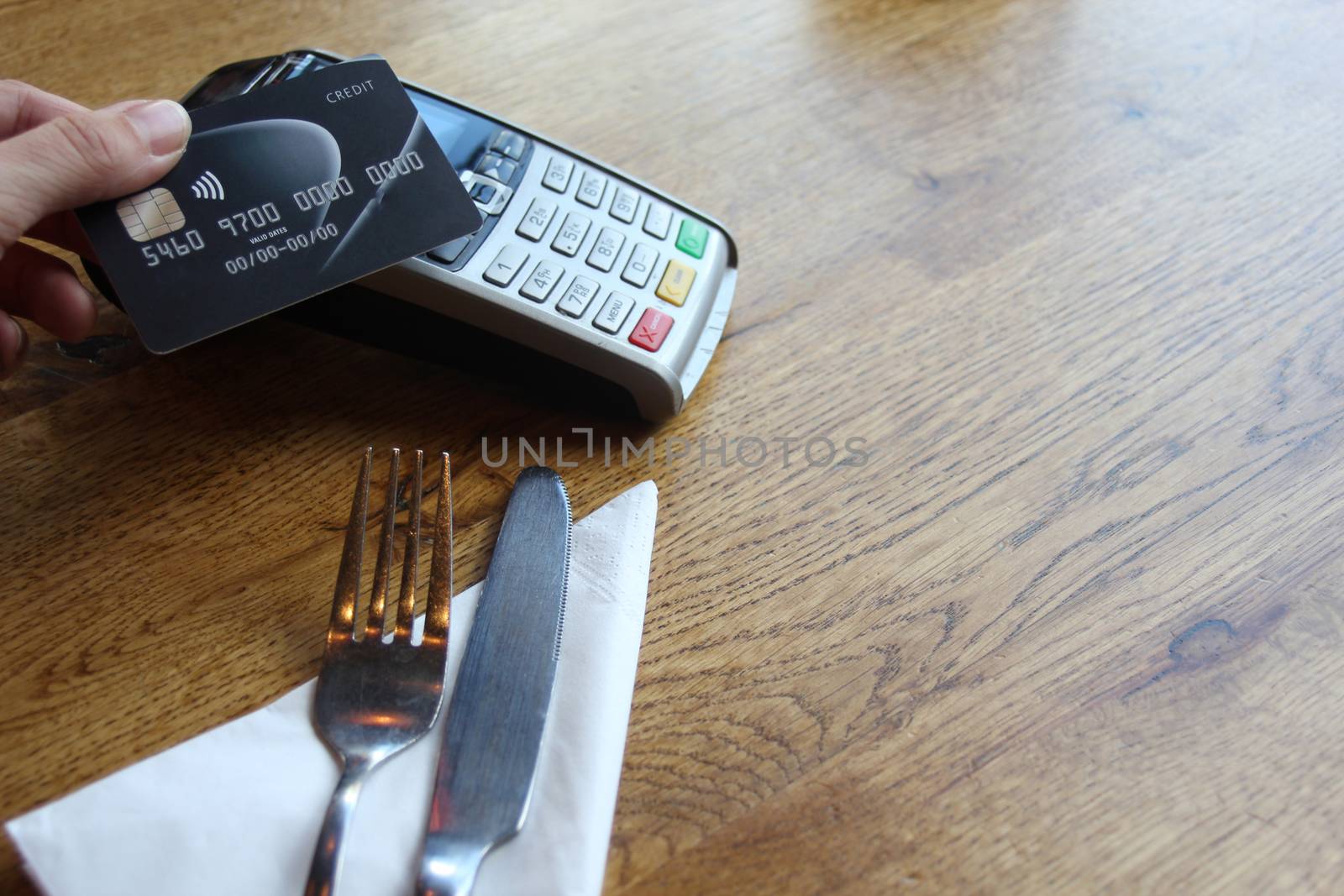 contactless payment card pdq background copy space with hand hol by cheekylorns