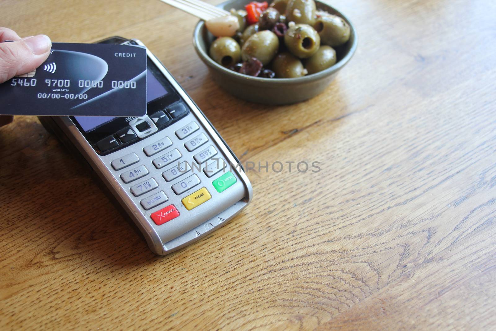 contactless payment card pdq background copy space with hand holding credit card ready to pay