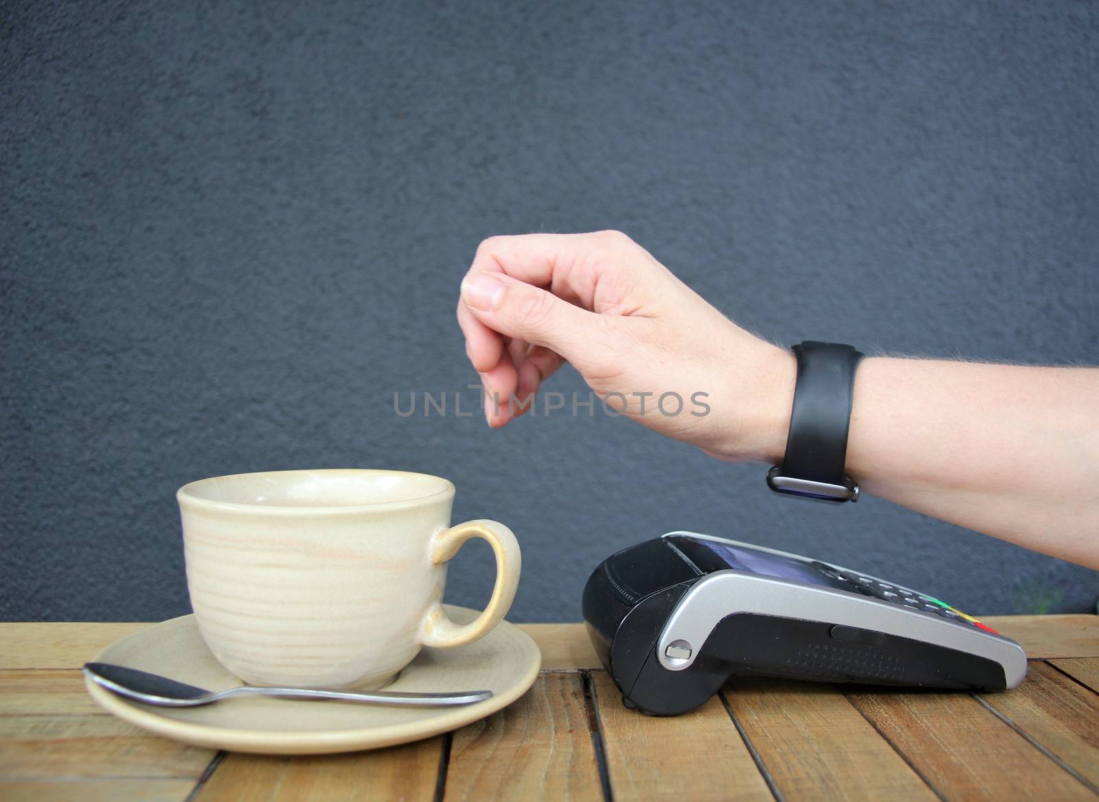contactless payment smartwatch watch pdq nfc background with copy space 