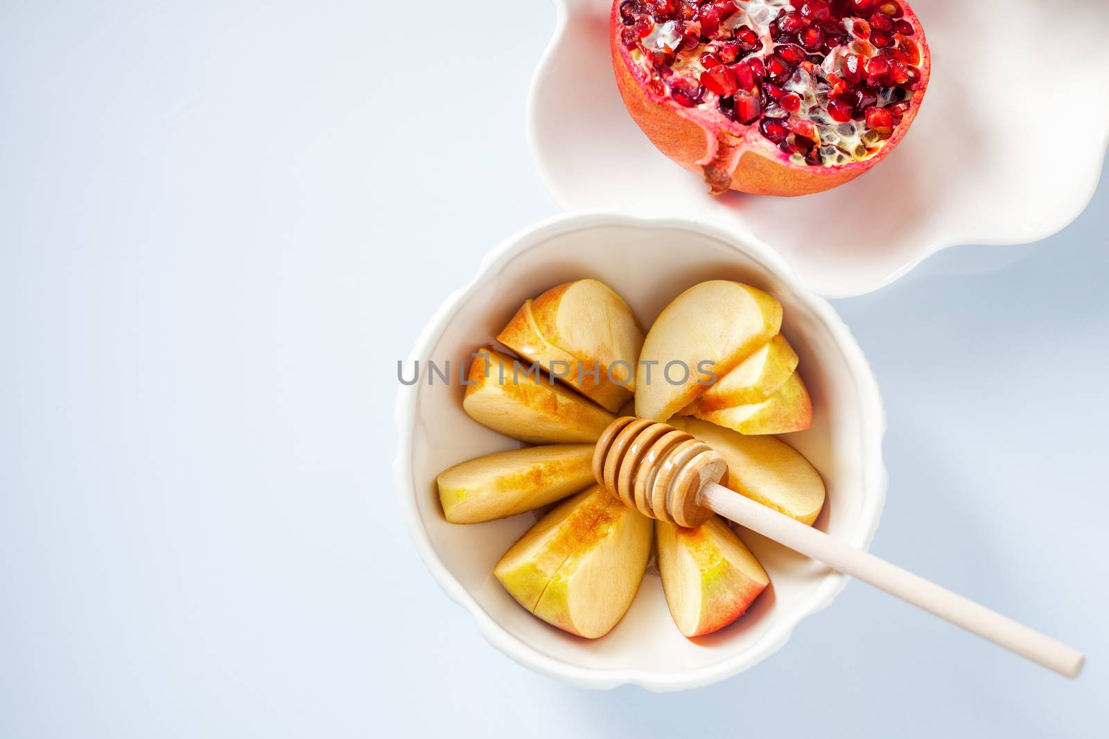 Apples, pomegranate and honey for Rosh Hashanah by supercat67