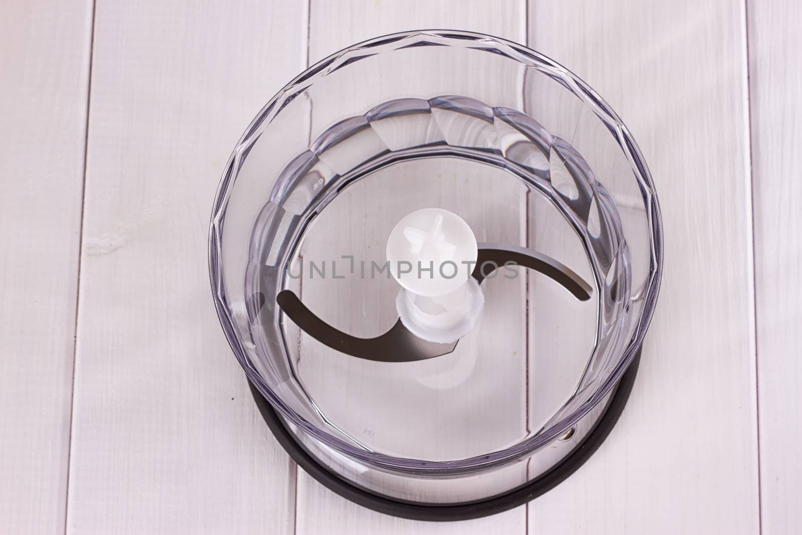 Plastic blender with steel knives, top view, on white background