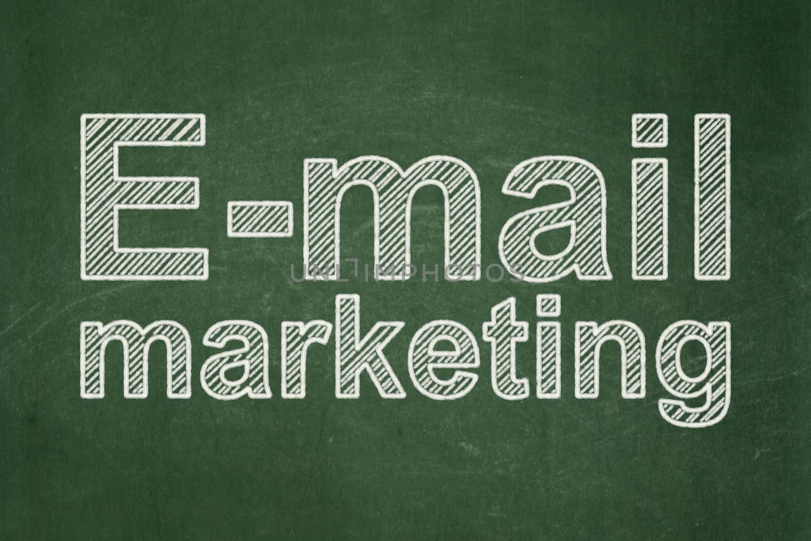 Marketing concept: E-mail Marketing on chalkboard background by maxkabakov