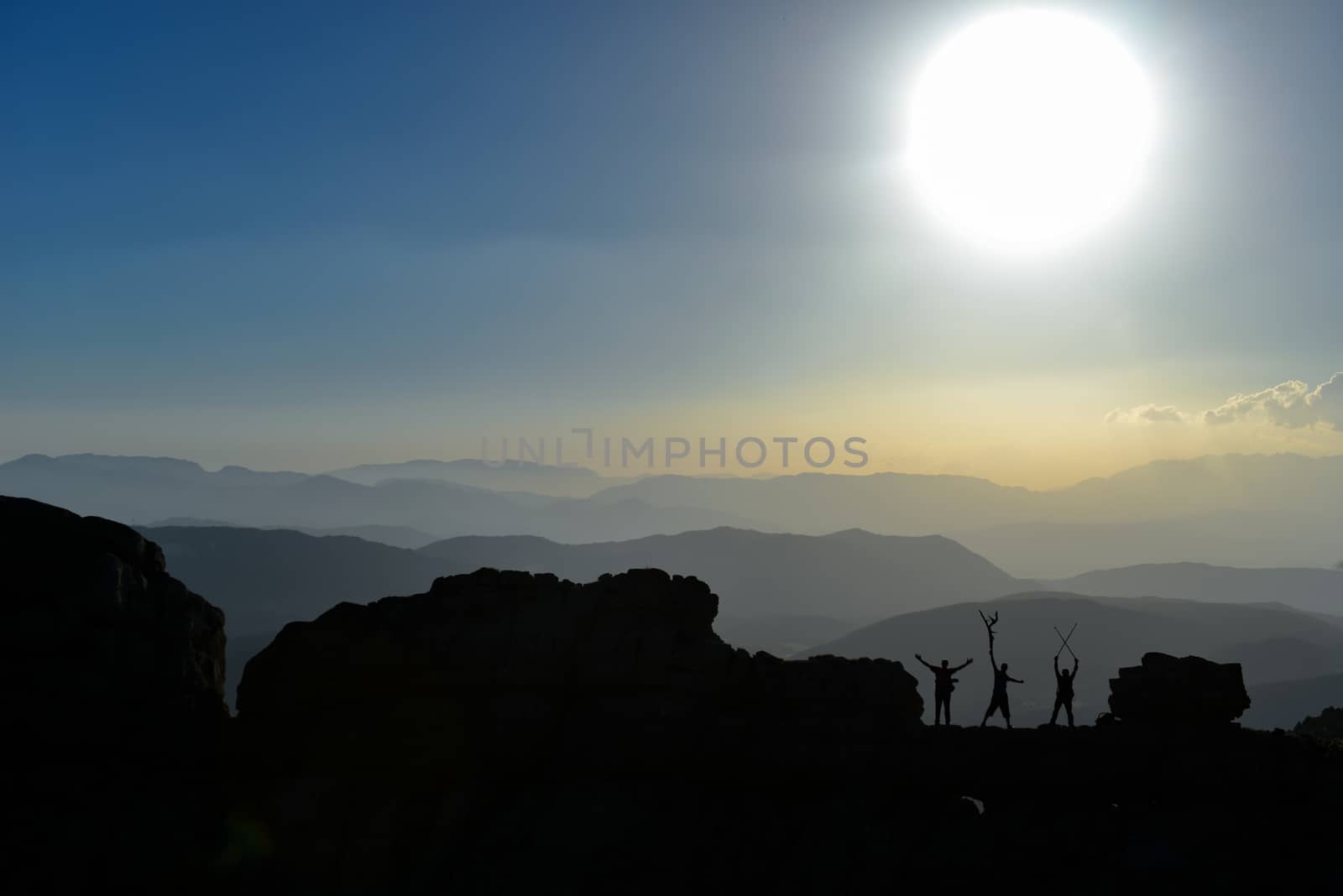 Successful mountaineering group in the summit mountains