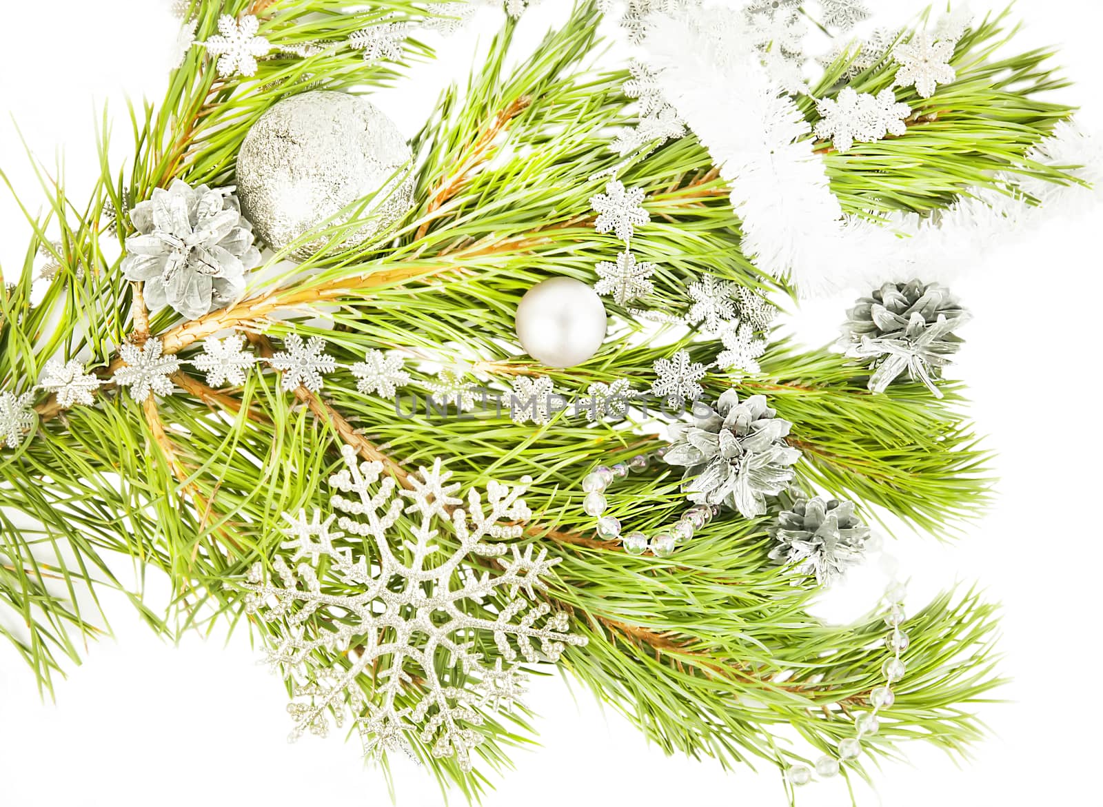 New year composition with fir tree, artificial snowflake and silver ball close up