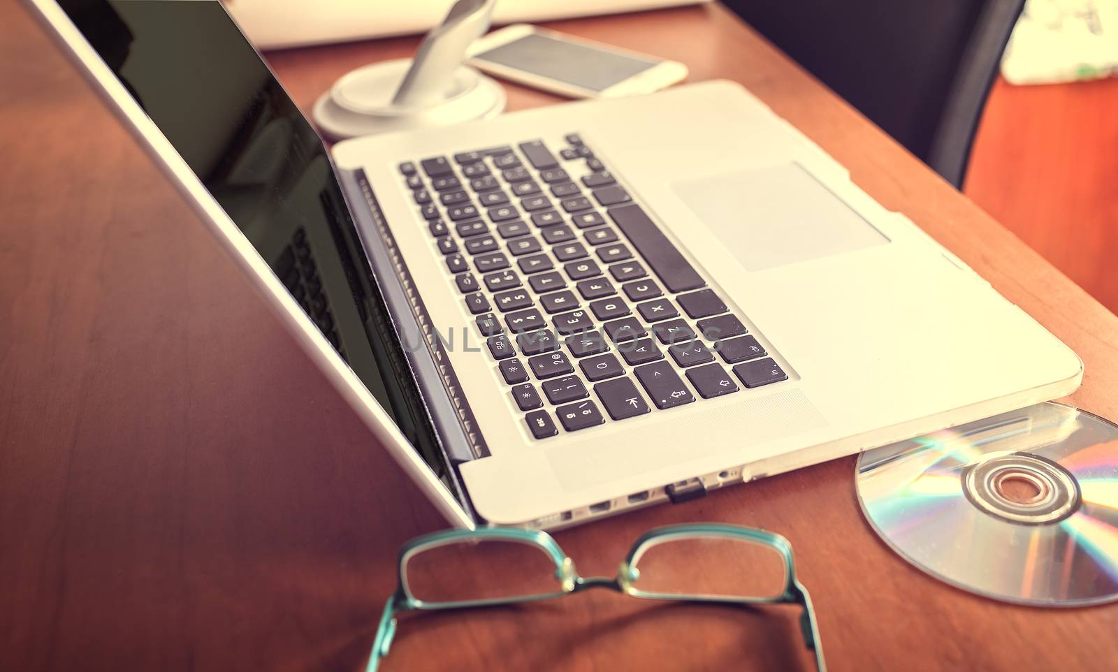 Lap top on a wooden table