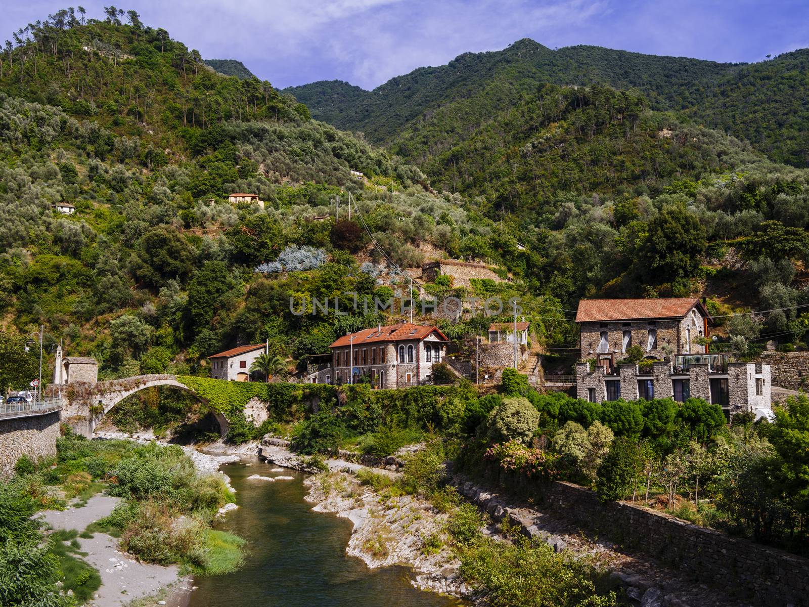 Bridge and river in Badalucco Italy by sumners