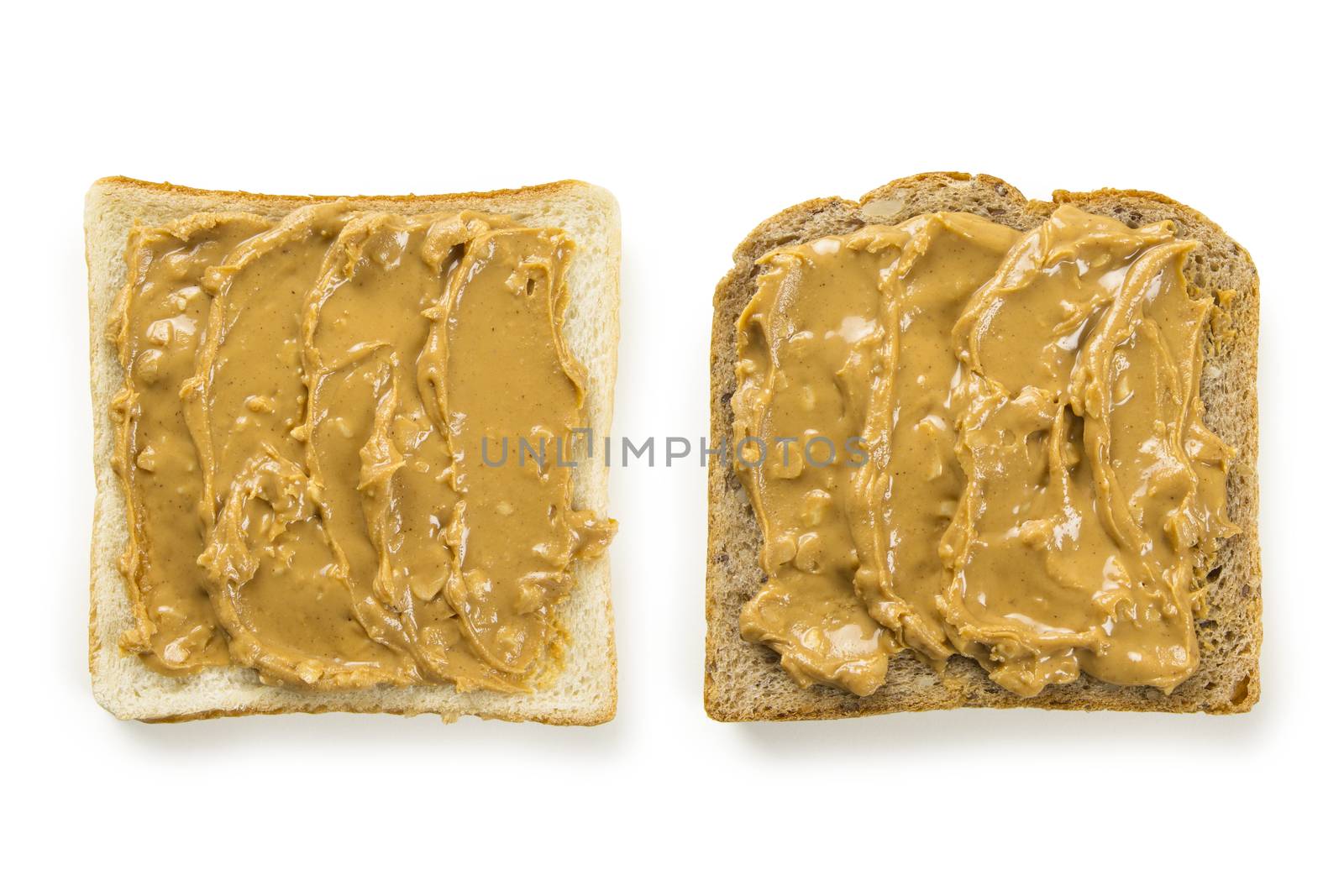 Slices of bread with peanut butter by sumners