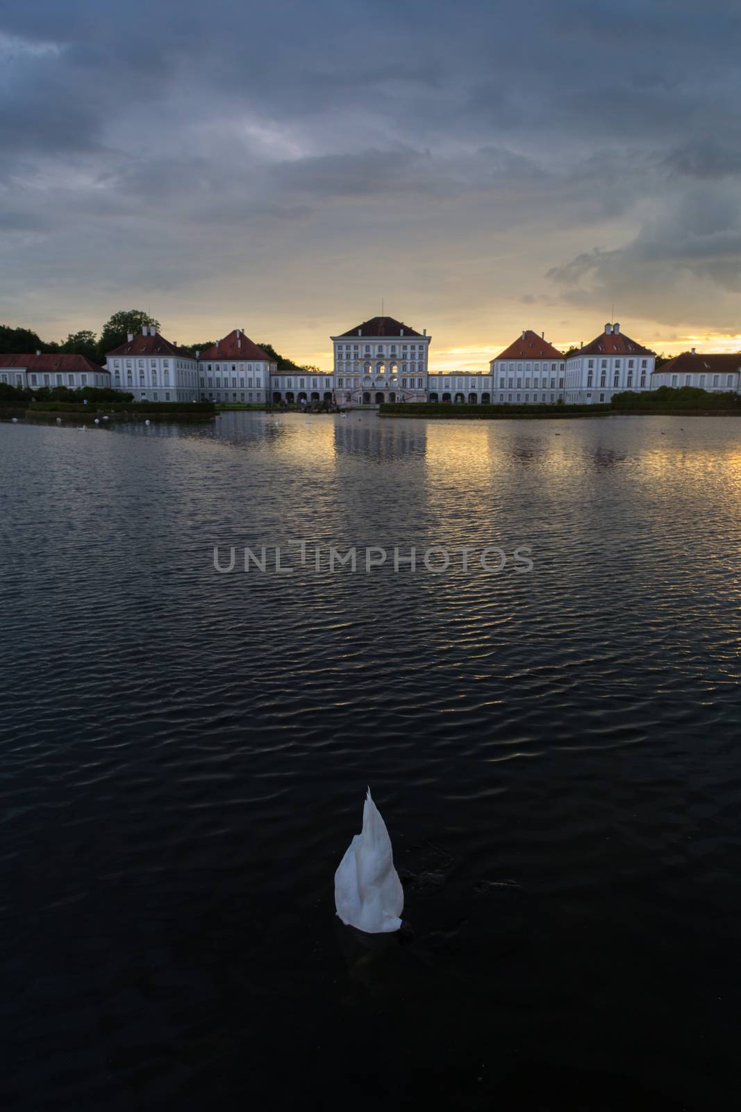 Dramatic scenery of post storm sunset of Nymphenburg palace in Munich Germany. by kasto