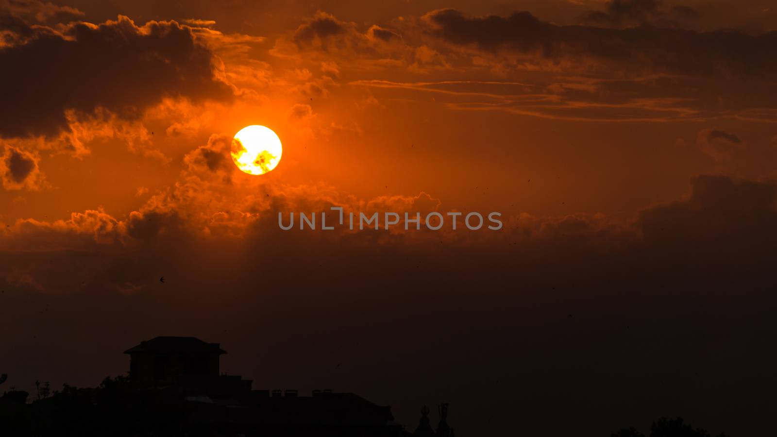 crimson sunset and the fiery sun