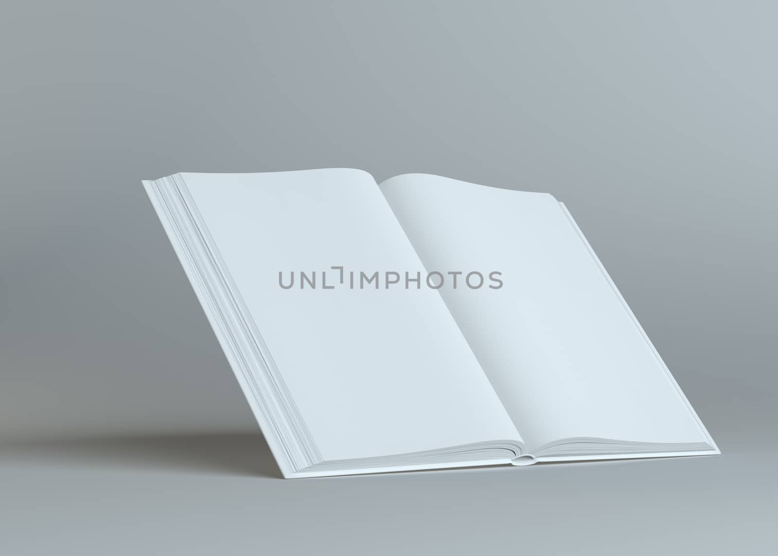 White empty open book on gray background by cherezoff