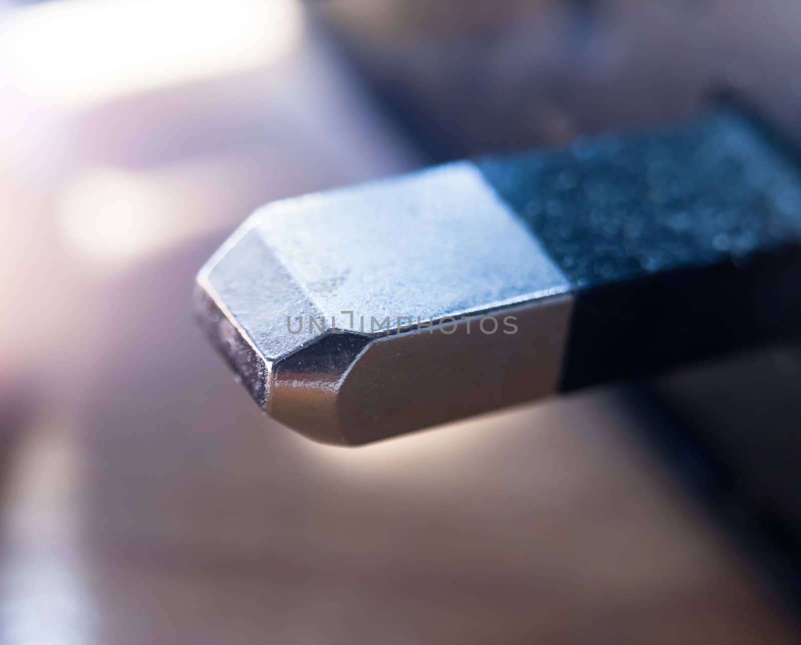 close up macro of metal electrical plug end; UK