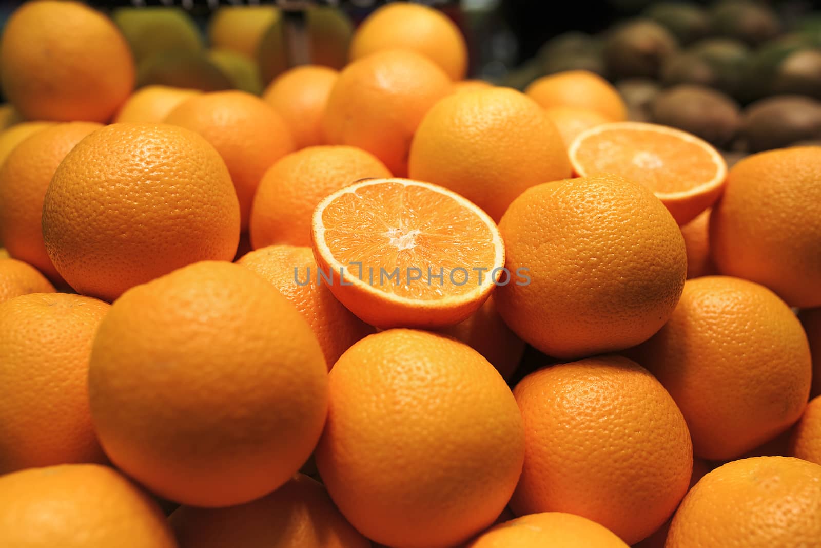 group of oranges in a market