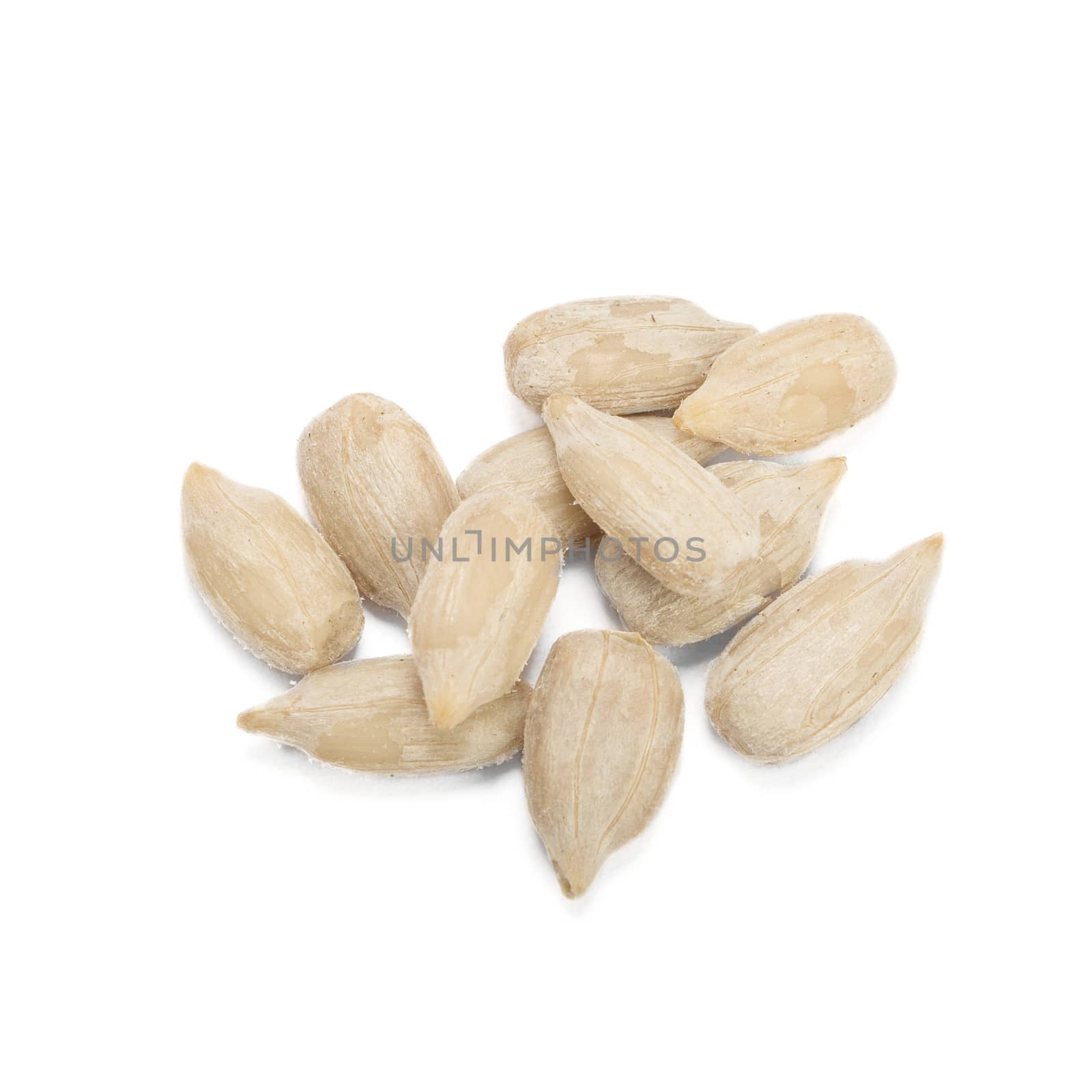 Pile of sunflower seeds isolated on white background.