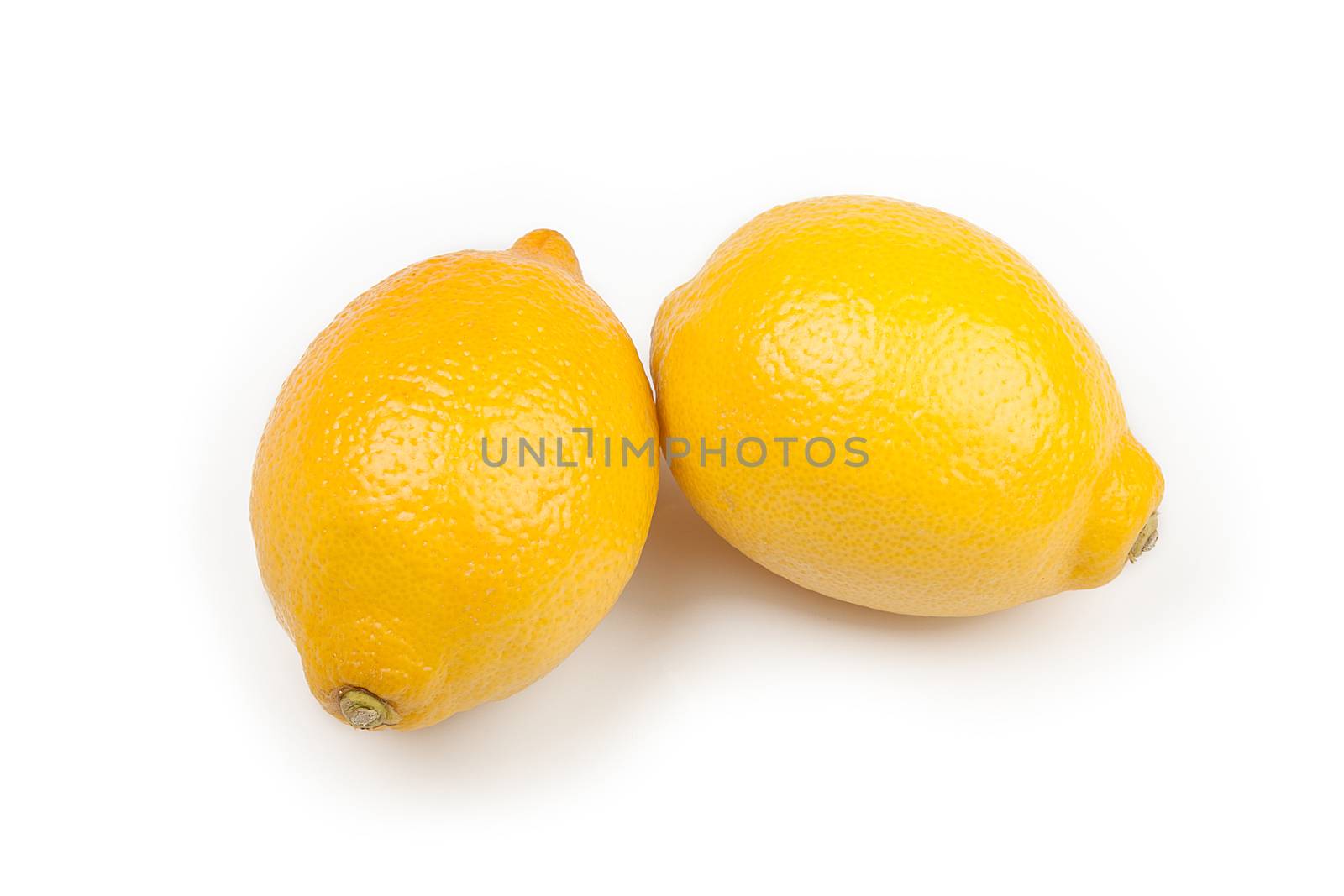 lemons isolated on white background, two yellow lemons