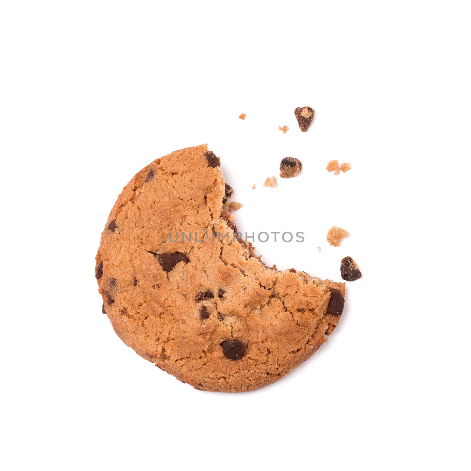 Single round chocolate chip biscuit with crumbs and bite missing, isolated on white from above. by ivo_13