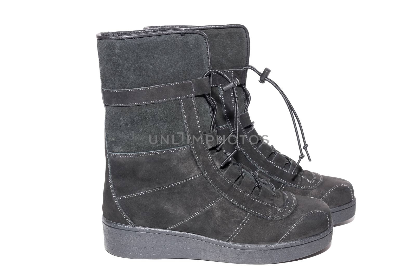 Female suede boots on white background, isolated, studio