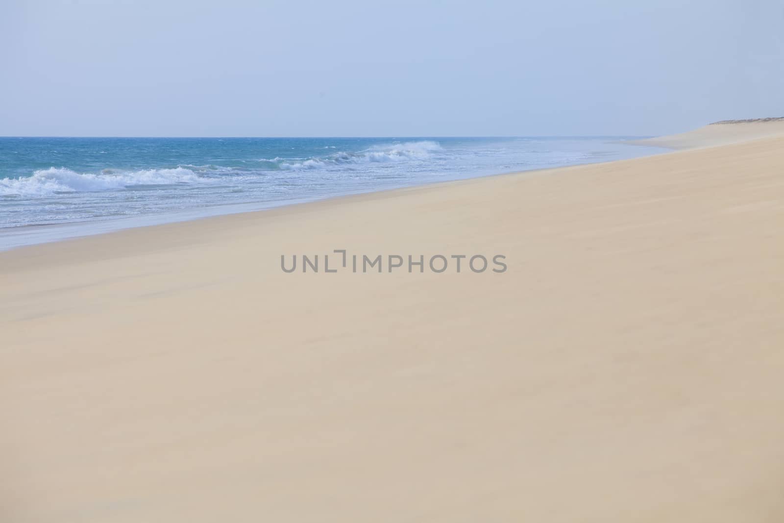 Beautiful seascape with foamy waves on Nang Thong Beach, Andaman Sea, Khao Lak, Thailand. Relaxing on Thai paradise beach with foamy waves. Nature composition.