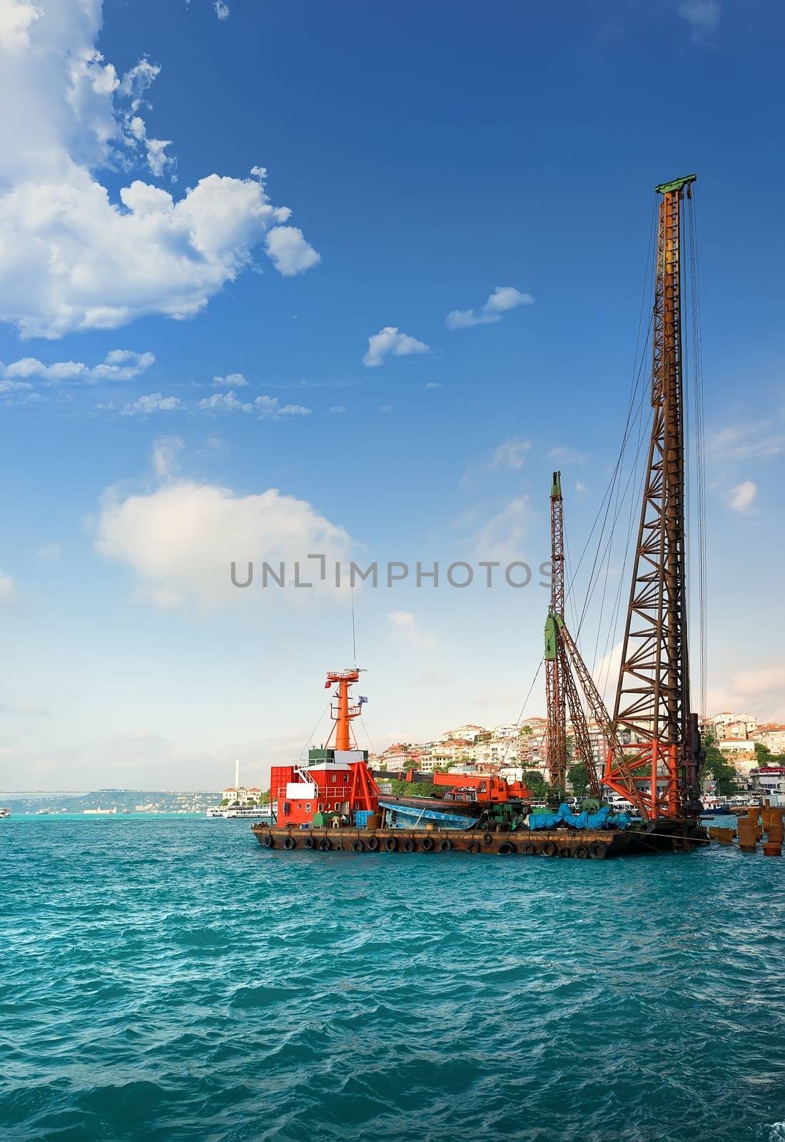 Cargo ship at the harbour of Bosphorus in Istanbul, Turkey