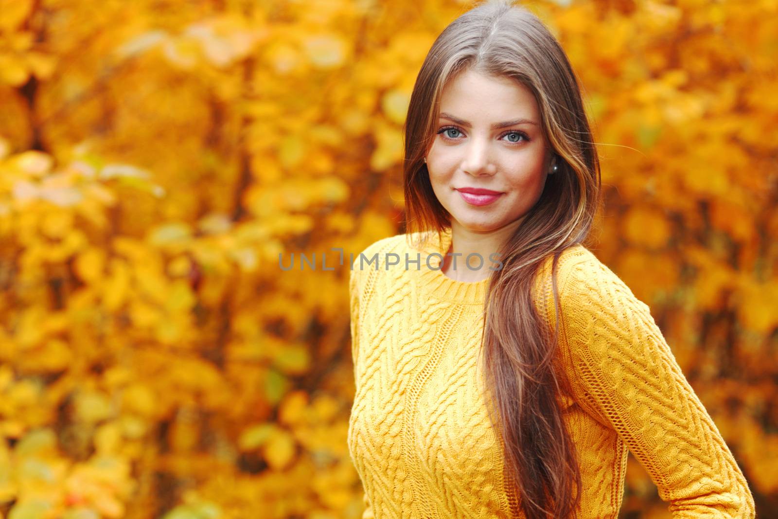 Autumn portrait of happy lovely and beautiful young woman